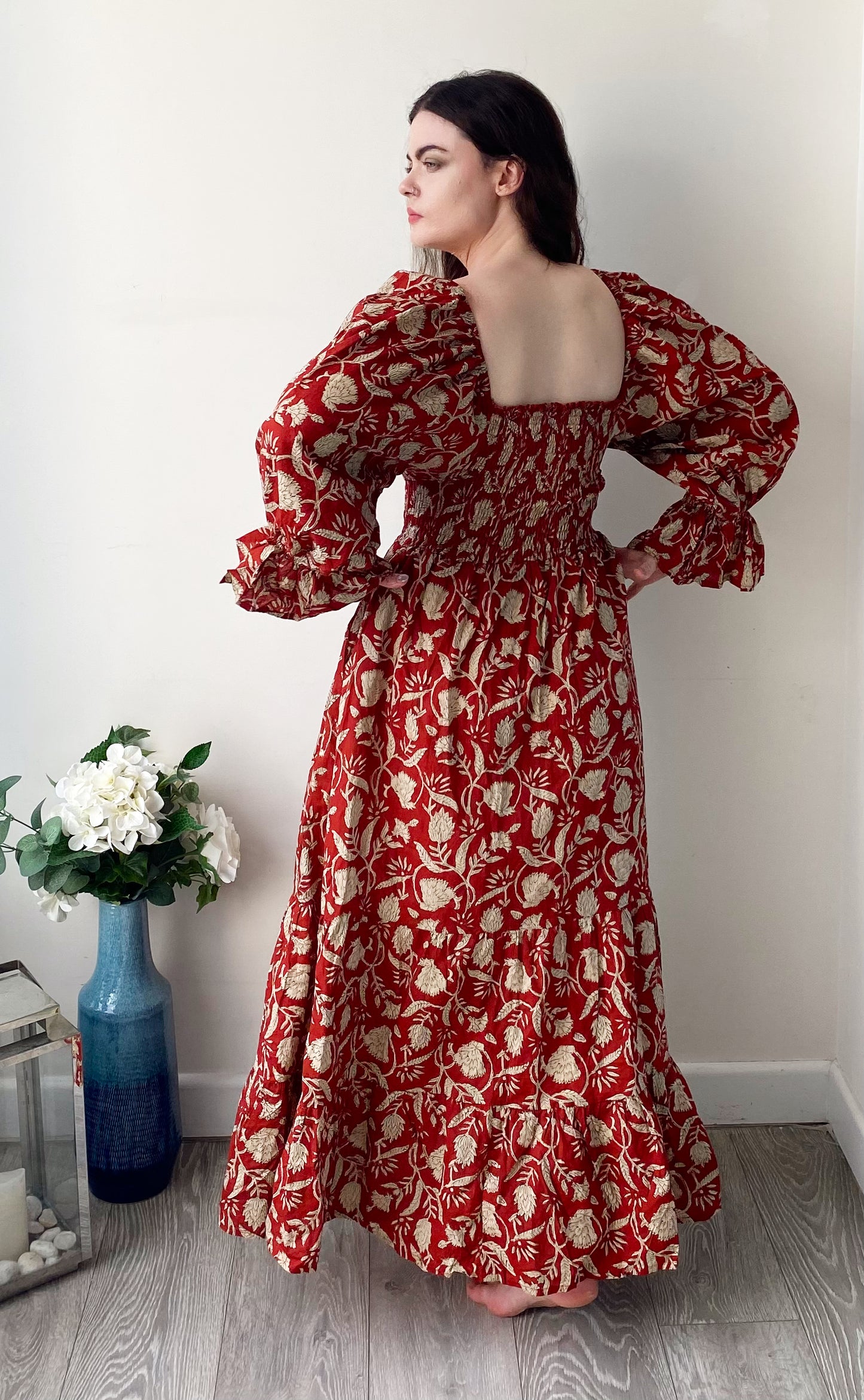 Lila brick-red block-printed cotton bardot balloon-sleeved maxi dress