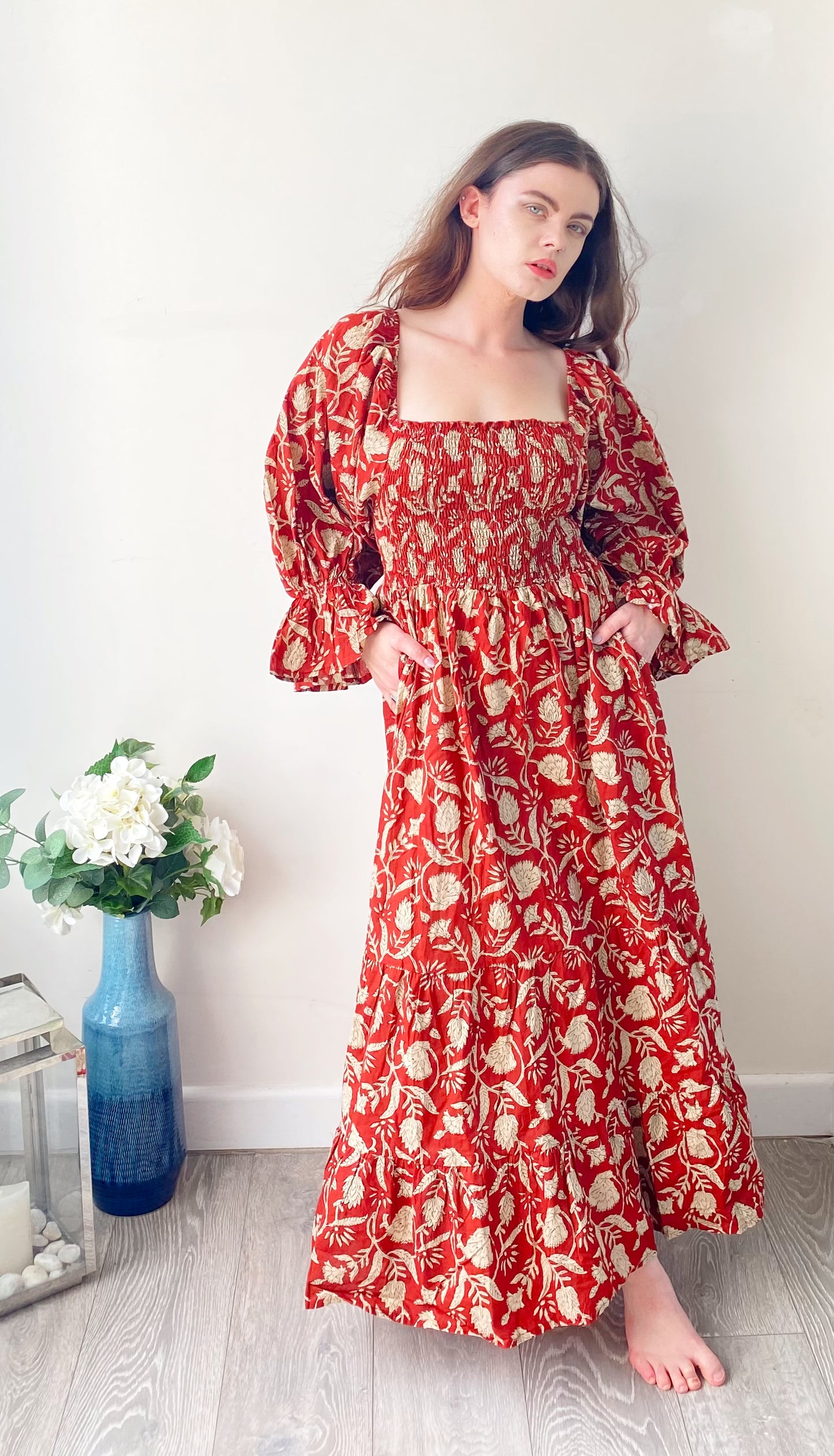 Lila brick-red block-printed cotton bardot balloon-sleeved maxi dress