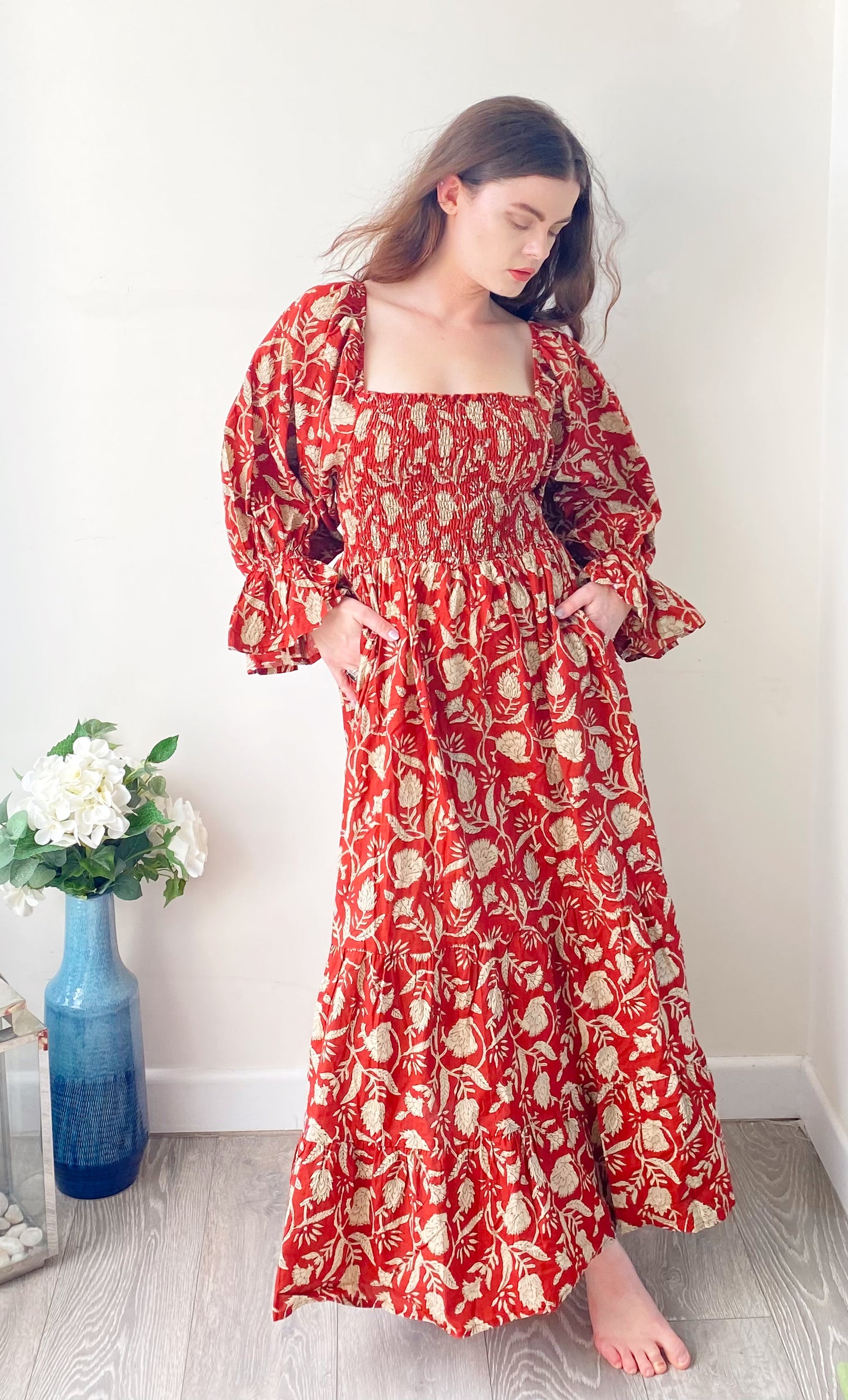 Lila brick-red block-printed cotton bardot balloon-sleeved maxi dress