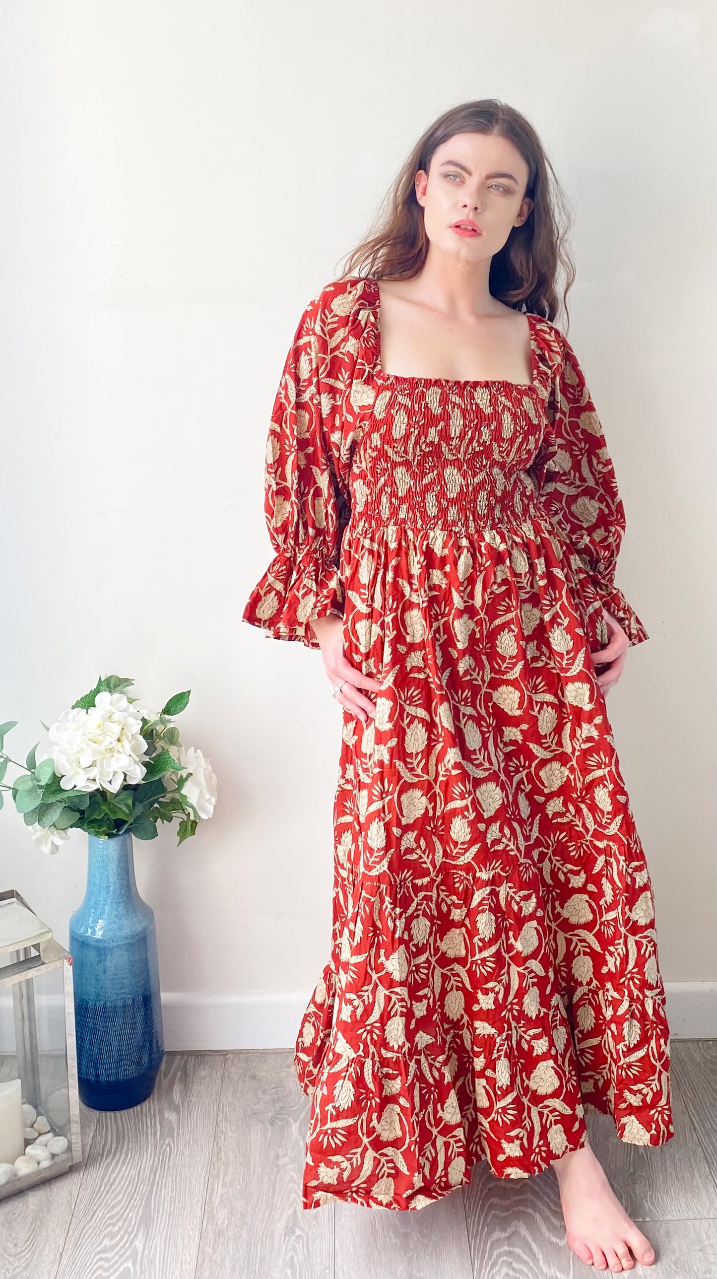 Lila brick-red block-printed cotton bardot balloon-sleeved maxi dress