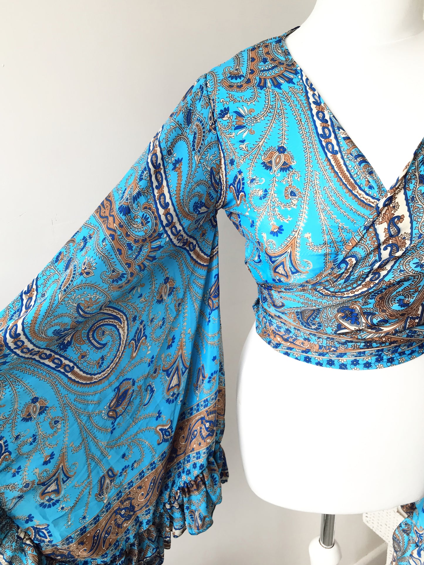 Stevie paisley-print sea-blue silk wrap tie frill-sleeve topblouse