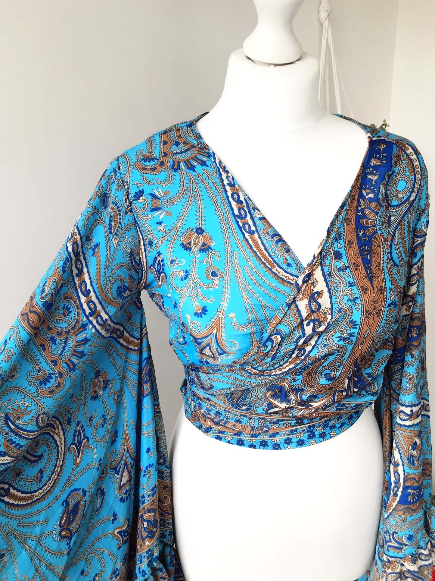 Stevie paisley-print sea-blue silk wrap tie frill-sleeve topblouse